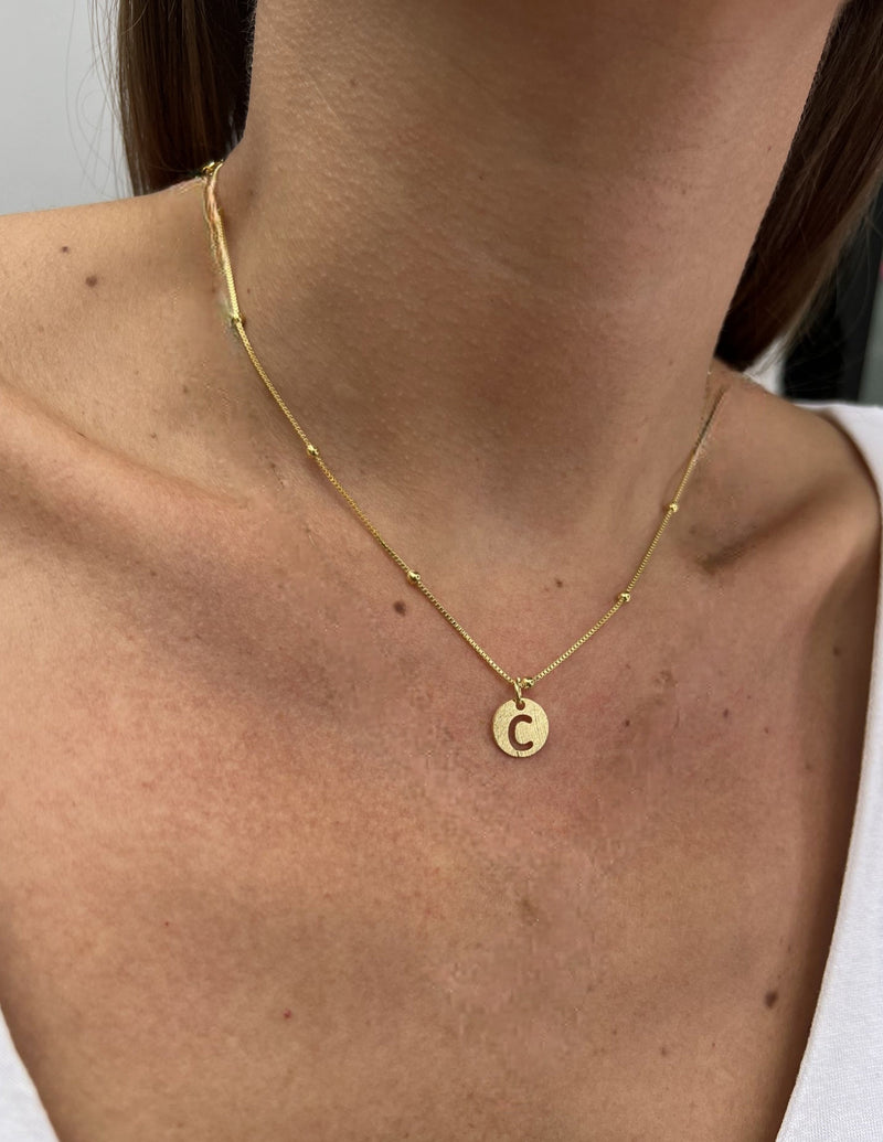 COLLAR ORO LETRA CALA